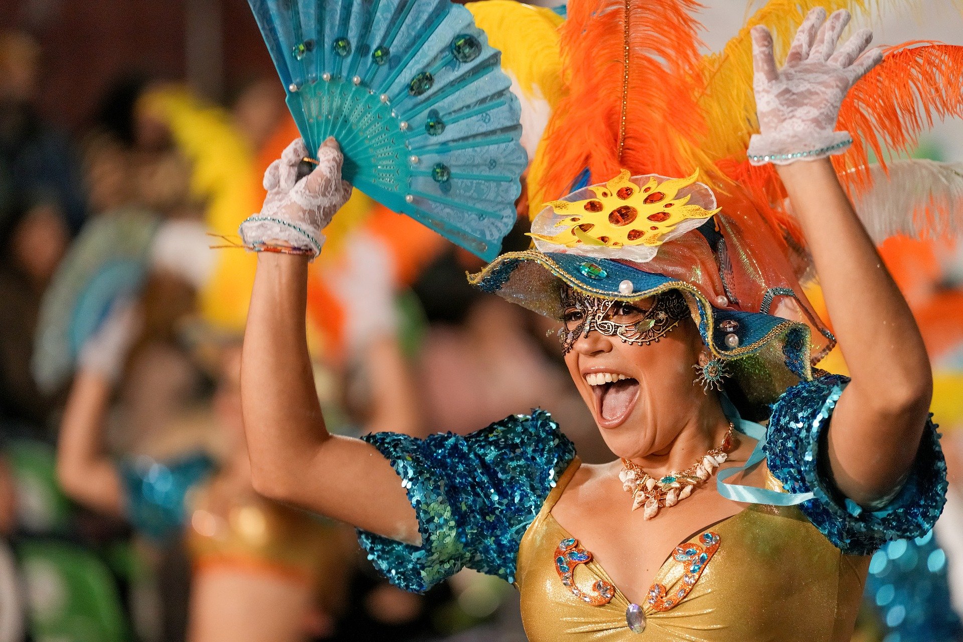 Traditional Cuenca carnival dancer in vibrant costume during a local festival